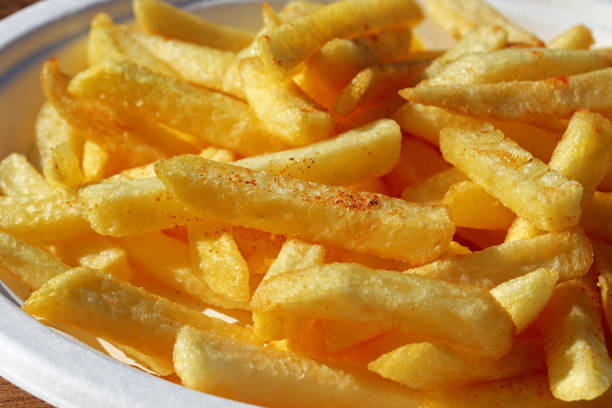 istock french fries on a white plate 1386399368