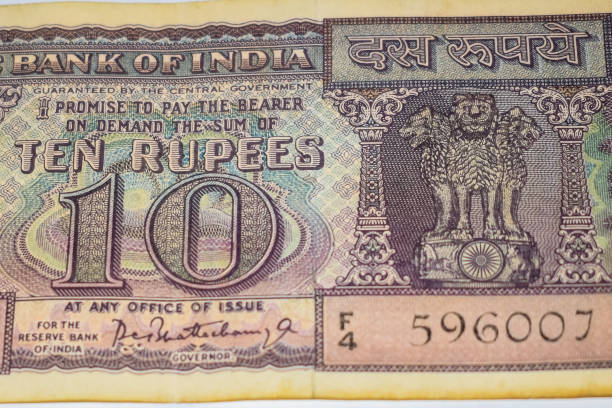 istock Close up view of rare ten rupee note on the table, Old Indian Currency notes on a rotating table, Rare Indian Currency close up view 1386402826