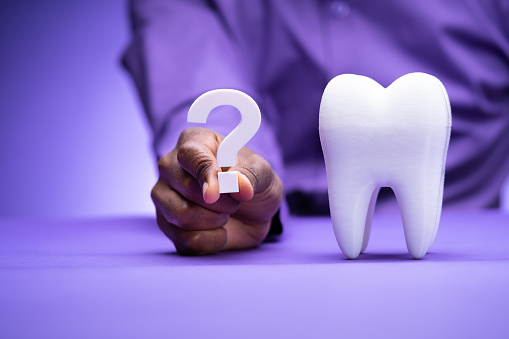 Man Dental Teeth Question Mark. Dentist FAQs