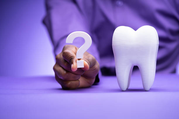 Man Dental Teeth Question Mark Man Dental Teeth Question Mark. Dentist FAQs tooth enamel stock pictures, royalty-free photos & images