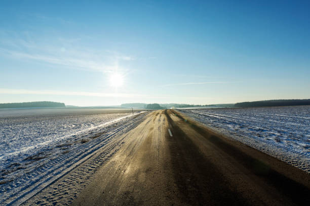 istock dangerous road in winter after snowfall, 1386409384