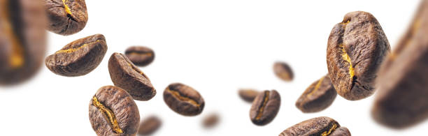istock Coffee beans levitate on a white background 1386412485