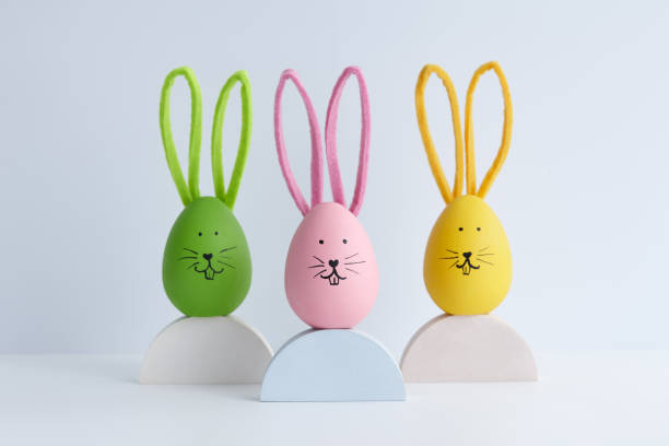 istock Colorful Easter eggs with bunny faces, holiday decoration 1386412718
