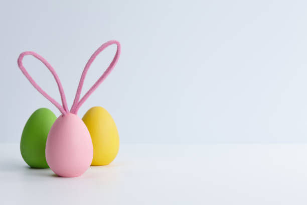 istock Colorful Easter eggs with bunny ears, holiday decoration 1386412759
