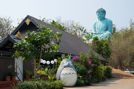 The Great Buddha (Daibutsu) buddha at the Wat Doi Phra Chan Buddhist temple the city of Mae Tha in Lampang,Thailand.