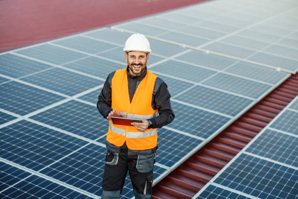 istock Portrait of a supervisor testing solar panels on a tablet. 1386419929