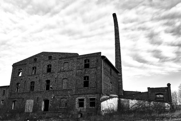 istock Ruins of a historic brewery with a sloping brick chimney 1386425184