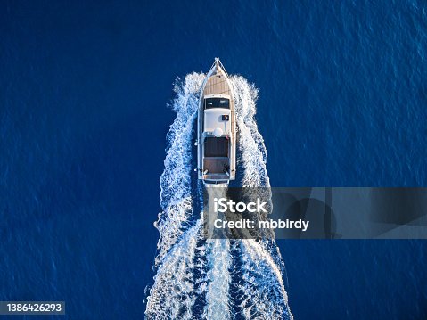 istock Speedboat racing along the open sea 1386426293