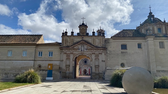Sevilla, Spain – March 13, 2022:  Entrance gate of the Monastery of Santa Maria de las Cuevas (Spanish: Monasterio de Santa María de las Cuevas).