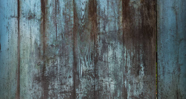istock Old and grunge wood panels used as background 1386452754