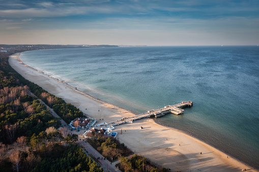 Pier in Brzezno and the beach of the Baltic Sea in Gdansk. Poland