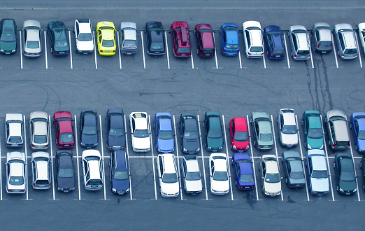 photo of a car park with one place empty