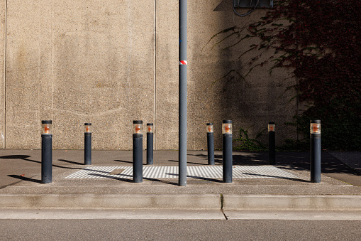 Group of bollards with warning lights