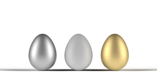 istock Easter eggs in silver, natural and gold in middle of white background 1386463682