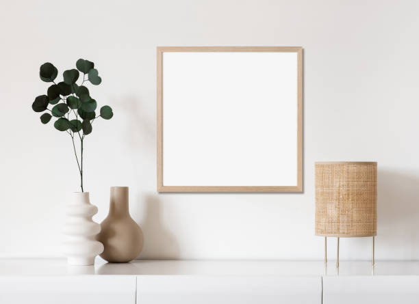 istock Artwork mock-up in interior design. Blank square shaped picture frame on a wall 1386465833