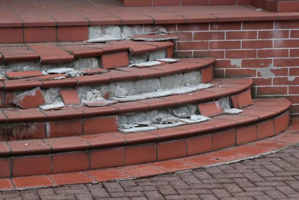 istock Broken concrete staircase. broken entrance stairs. 1386472150