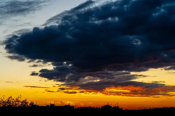 dramatic summer evening orange sky, bright colorful sunset