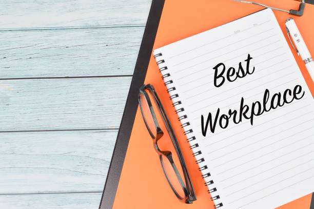 istock Top view of notebook written with text BEST WORKPLACE. 1386474823