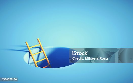 istock Ladder rises up from a hole in the ground. 1386475136