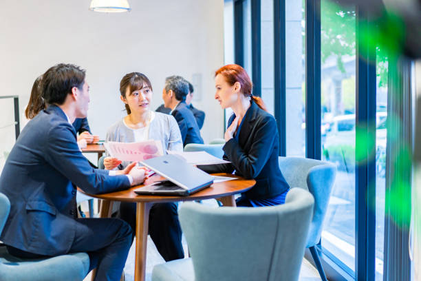 istock Staff having a meeting in an office 1386479143