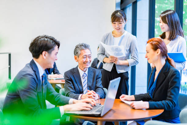istock Staff having a meeting in an office 1386479167