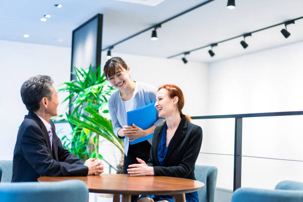 istock Interpreters and secretaries working in an office 1386479416