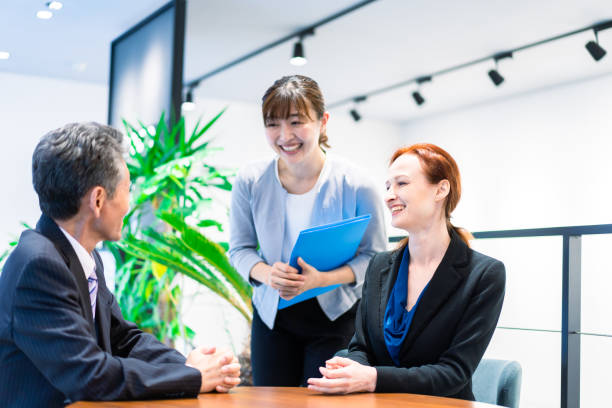 istock Interpreters and secretaries working in an office 1386479418