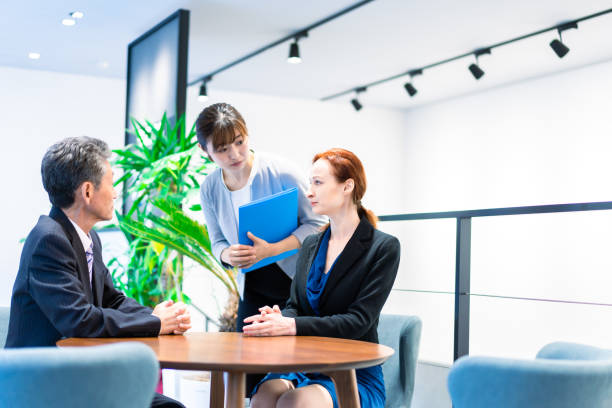 istock Interpreters and secretaries working in an office 1386479419
