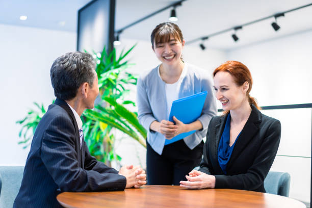 istock Interpreters and secretaries working in an office 1386479422