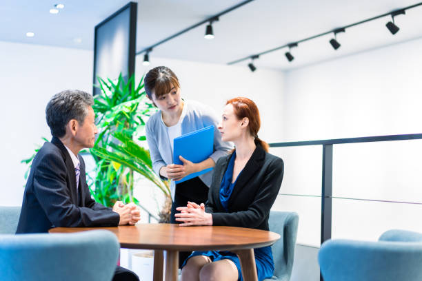 istock Interpreters and secretaries working in an office 1386479425