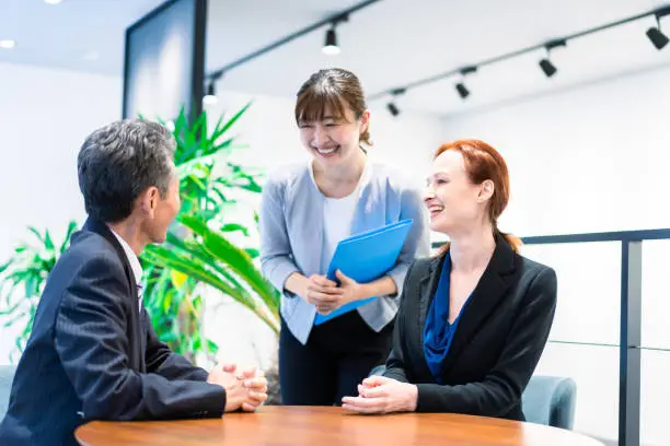 Interpreters and secretaries working in an office