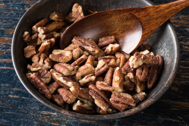 istock Pecan Halves in a Bowl 1386483974