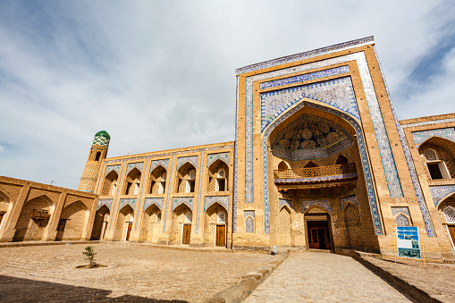 Exterior of the Kutlug-Murad Inaka Madrasa in Khiva, Uzbekistan, Central Asia. The madrassah of Kutlug-Murad-inak was the first two-storied madrassah in Khiva