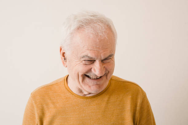 istock Characterful faces of a mature man 1386490258