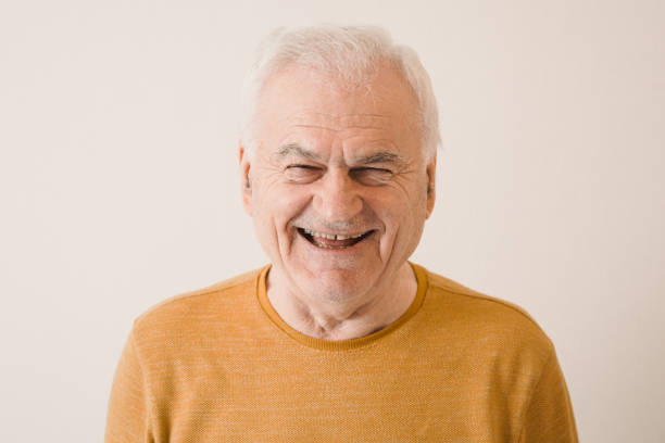 istock Characterful faces of a mature man 1386491277