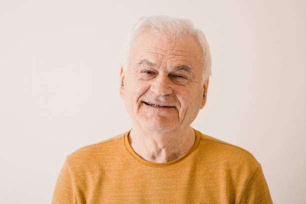 istock Characterful faces of a mature man 1386491569