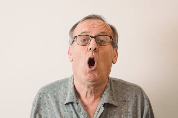 istock Characterful faces of a mature man 1386491829