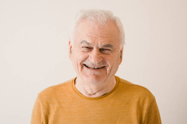 istock Characterful faces of a mature man 1386492524