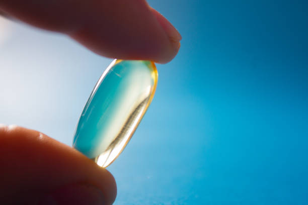 istock Close up of transparent pill 1386495239