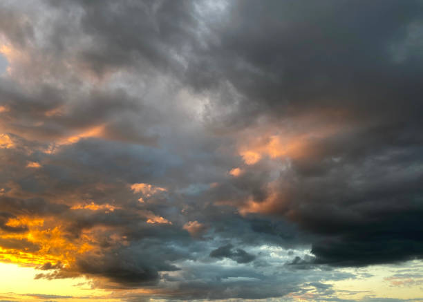 istock Beautiful sunset sky with a low clouds 1386496386