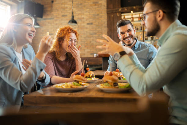 istock Having burger with friends and having great time 1386498301