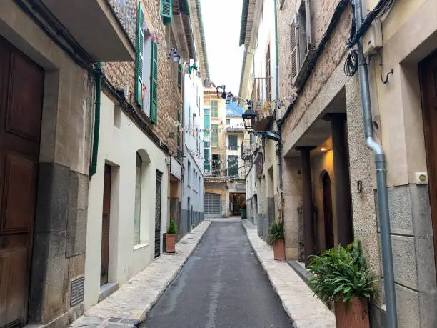 View of a narrow street at the old town of Sóller in Majorca, Balearic Islands, Spain