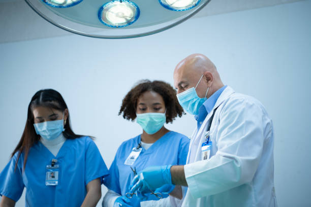 istock A medical professor is teaching surgery to medical students working 1386503766