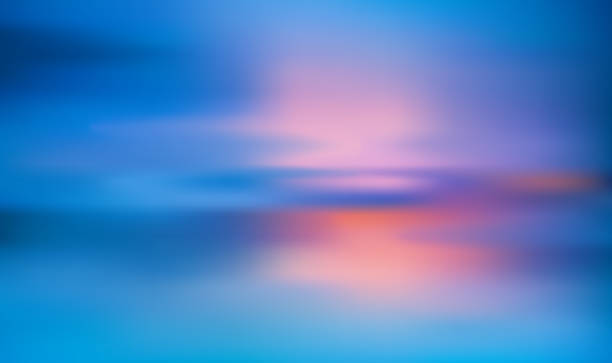 istock horizontal wide blue sky blurred background. Sunset and sunrise sea blurred background 1386503952