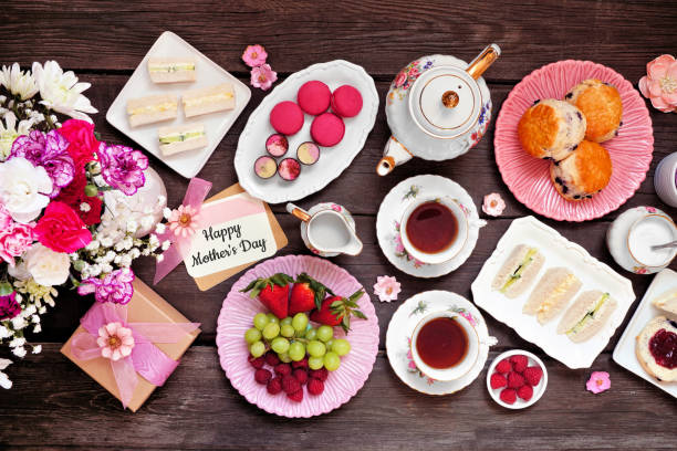 istock Mother's Day tea table scene against a dark wood background 1386504191