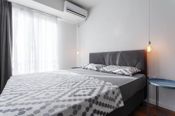 istock bedroom in a modern apartment 1386506663