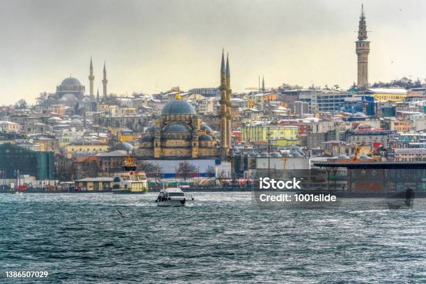 Yeni Cami And Beyazit Tower At Winter Stock Photo - Download Image Now