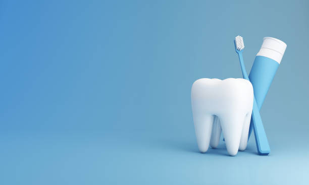 denti bianchi, spazzolino da denti e tubetto di dentifricio per la presentazione del prodotto isolati su sfondo blu, nel concetto di salute orale e cure dentali e igiene orale. rendering 3d - igienista dentale foto e immagini stock