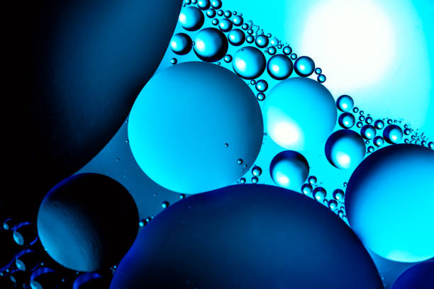 istock Bubbles of oxygen in water. Water structure. Blue abstract water bubbles texture background. 1386514429