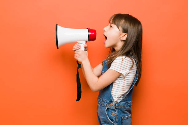 istock Little girl making a protest 1386514598